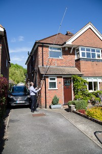 Matthew Brown, Director, surveying a property in Surrey